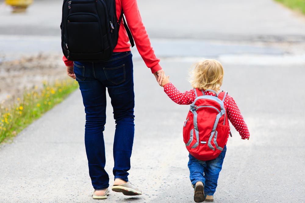 Parent And Child Going To Daycare Together